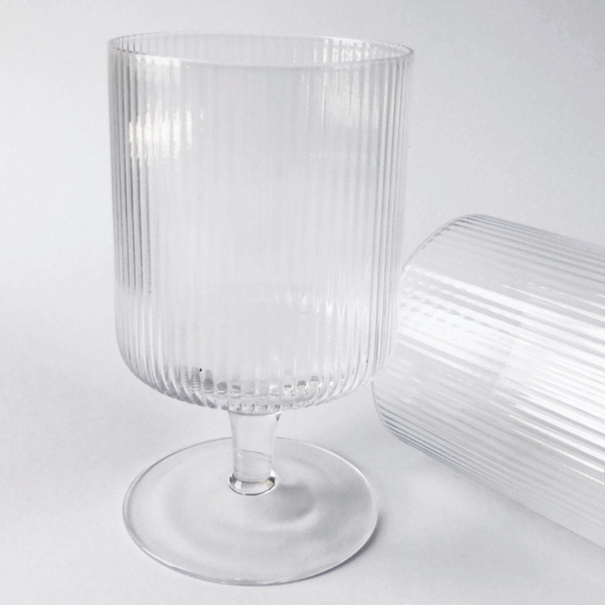 Ribbed Wine Glass set in a clear glass